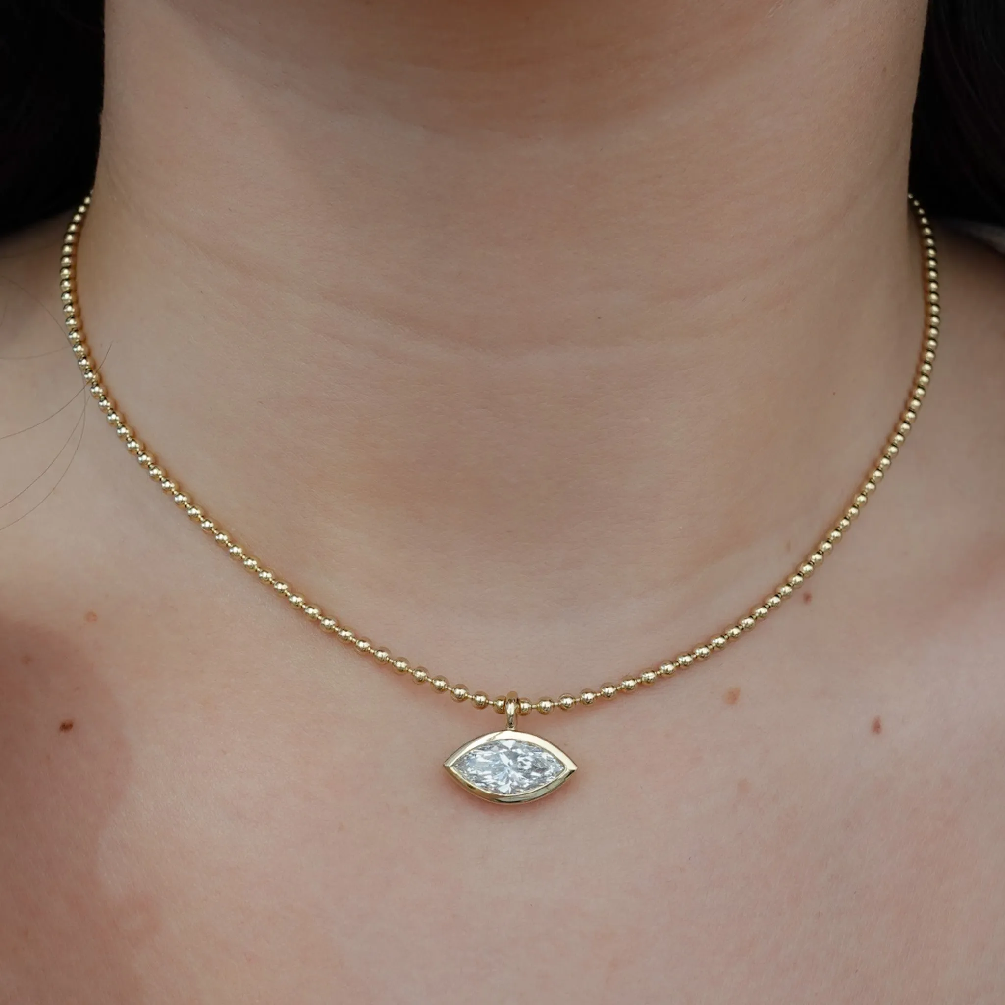 Bezel Set Pendant Beaded Necklace with East West Marquise Cut Diamond