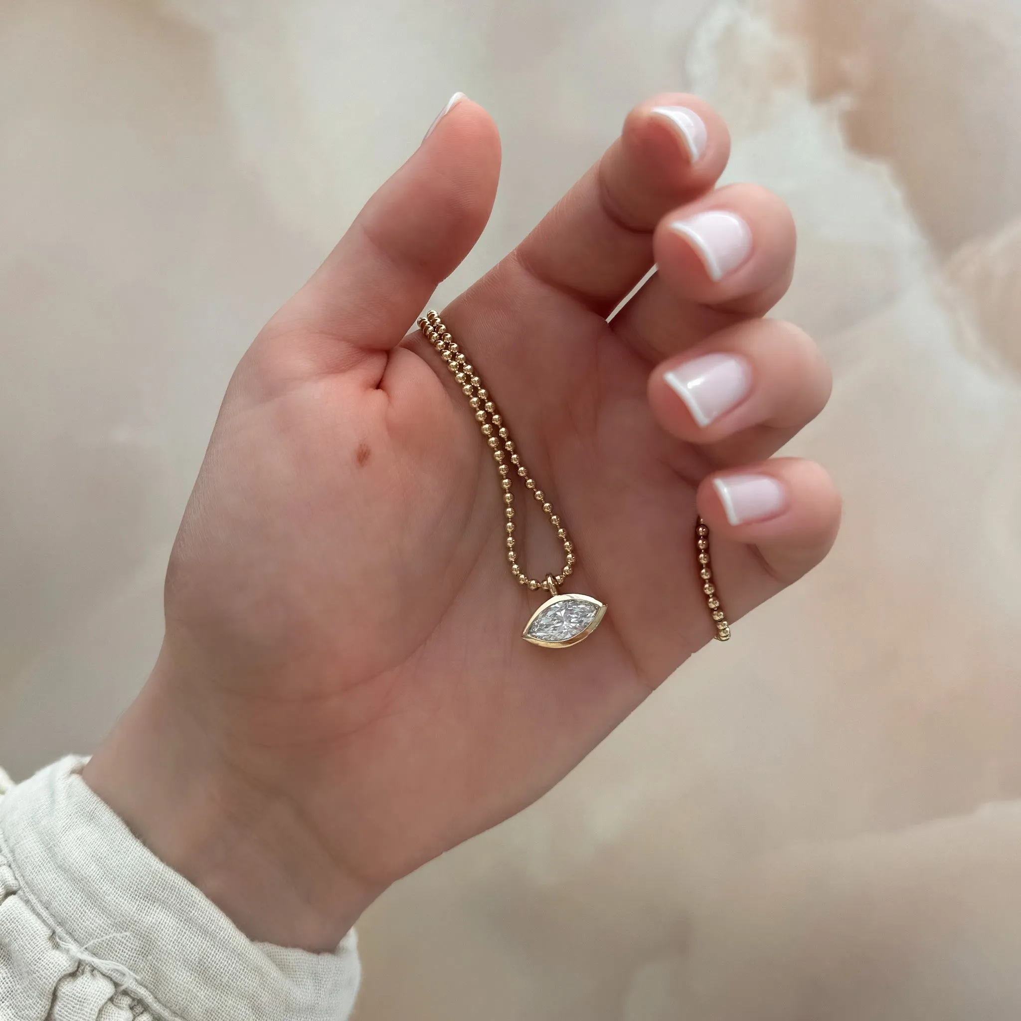 Bezel Set Pendant Beaded Necklace with East West Marquise Cut Diamond