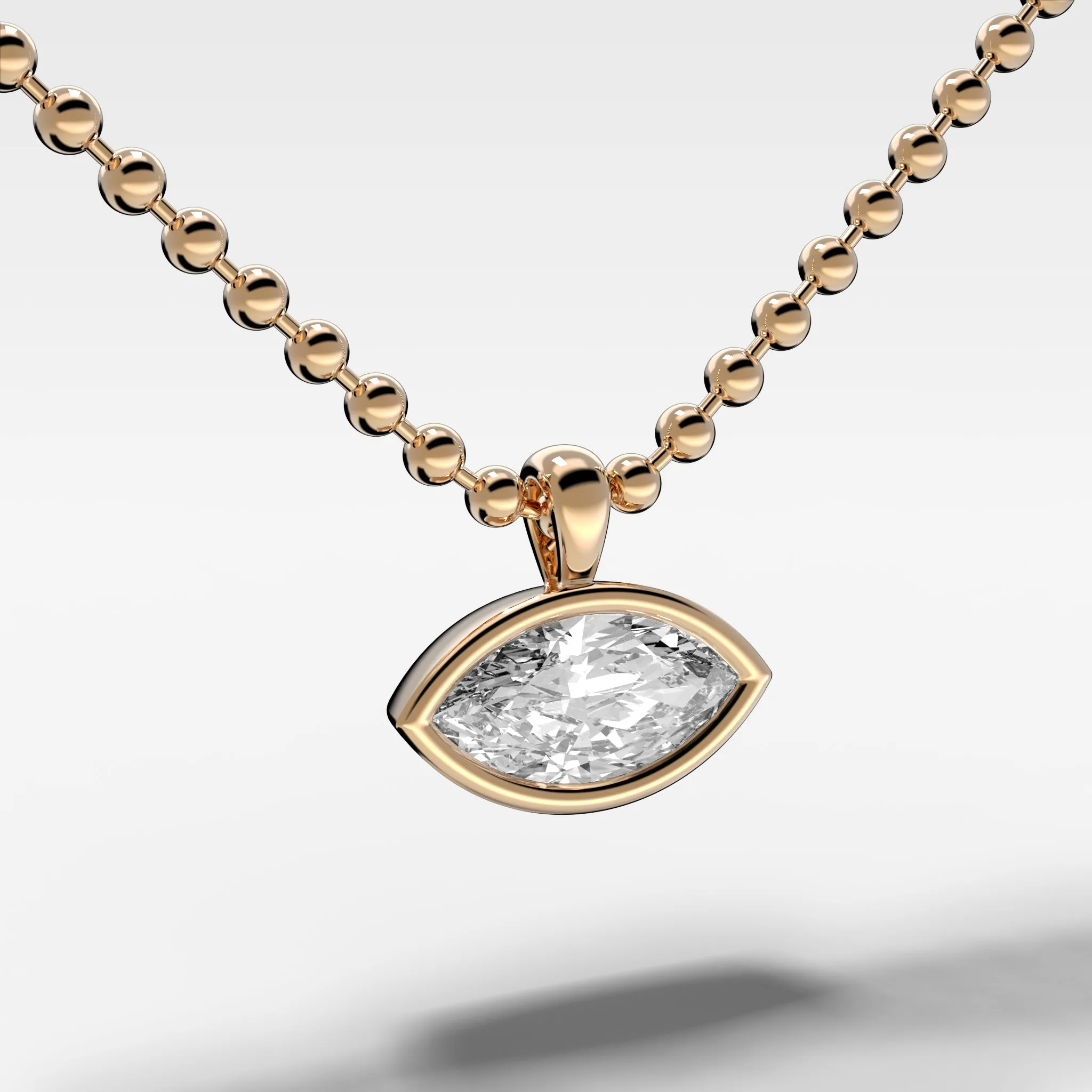 Bezel Set Pendant Beaded Necklace with East West Marquise Cut Diamond