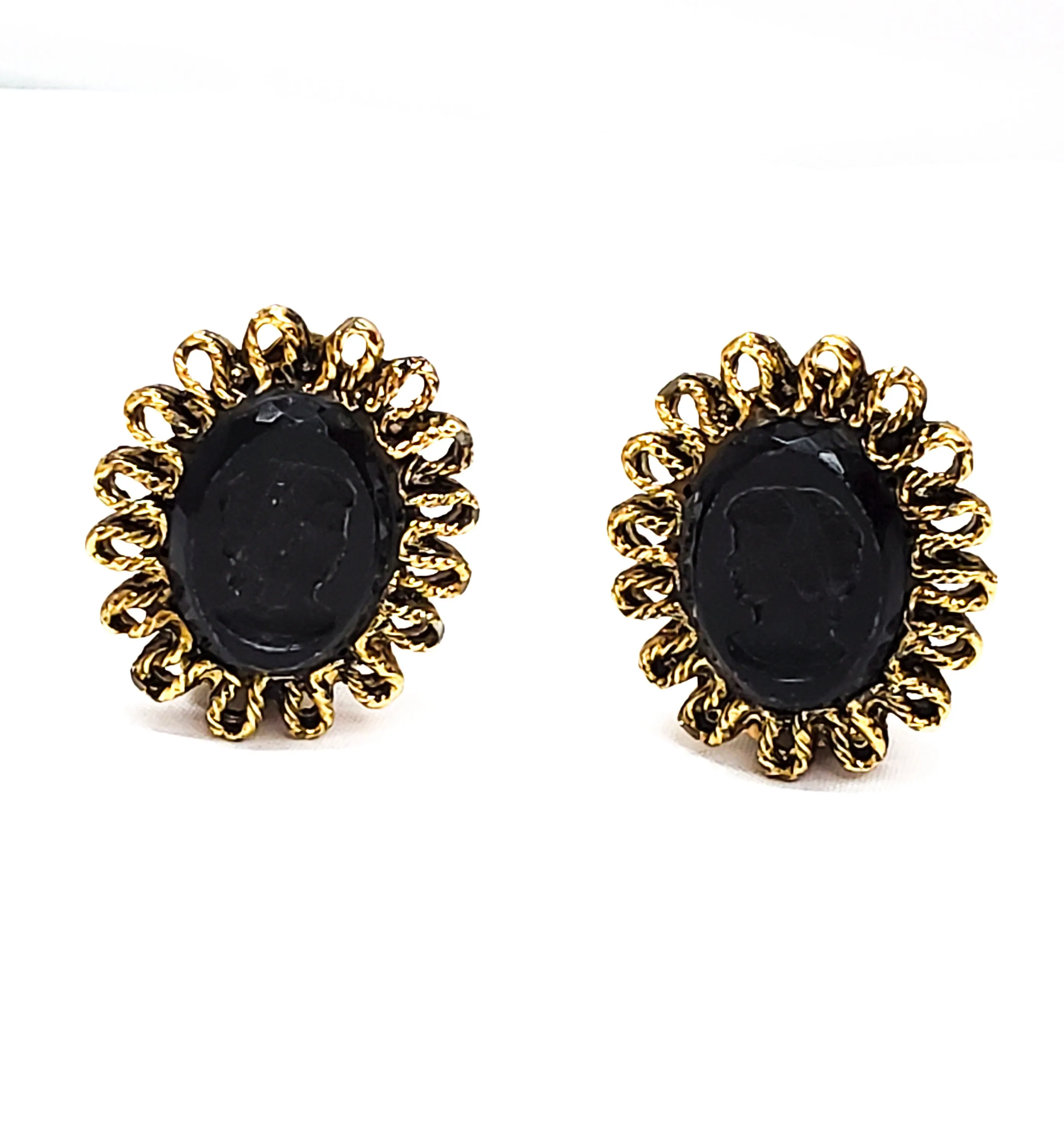 Black Glass reversed carved cameo clip on vintage earrings mid century