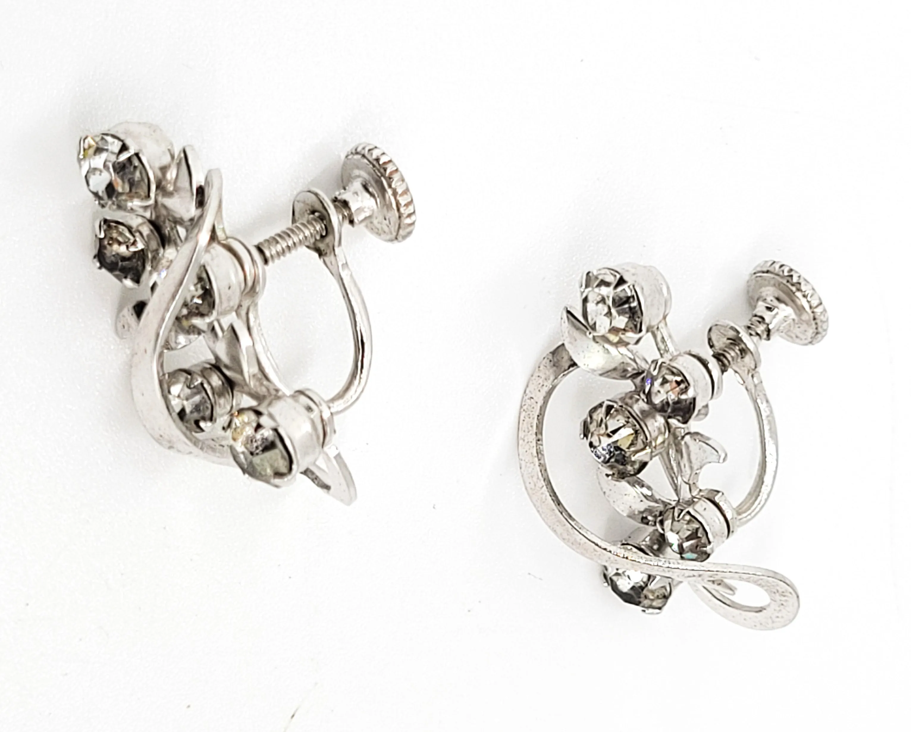 Clear rhinestone atomic swirl vintage clear mid century silver screw back earrings
