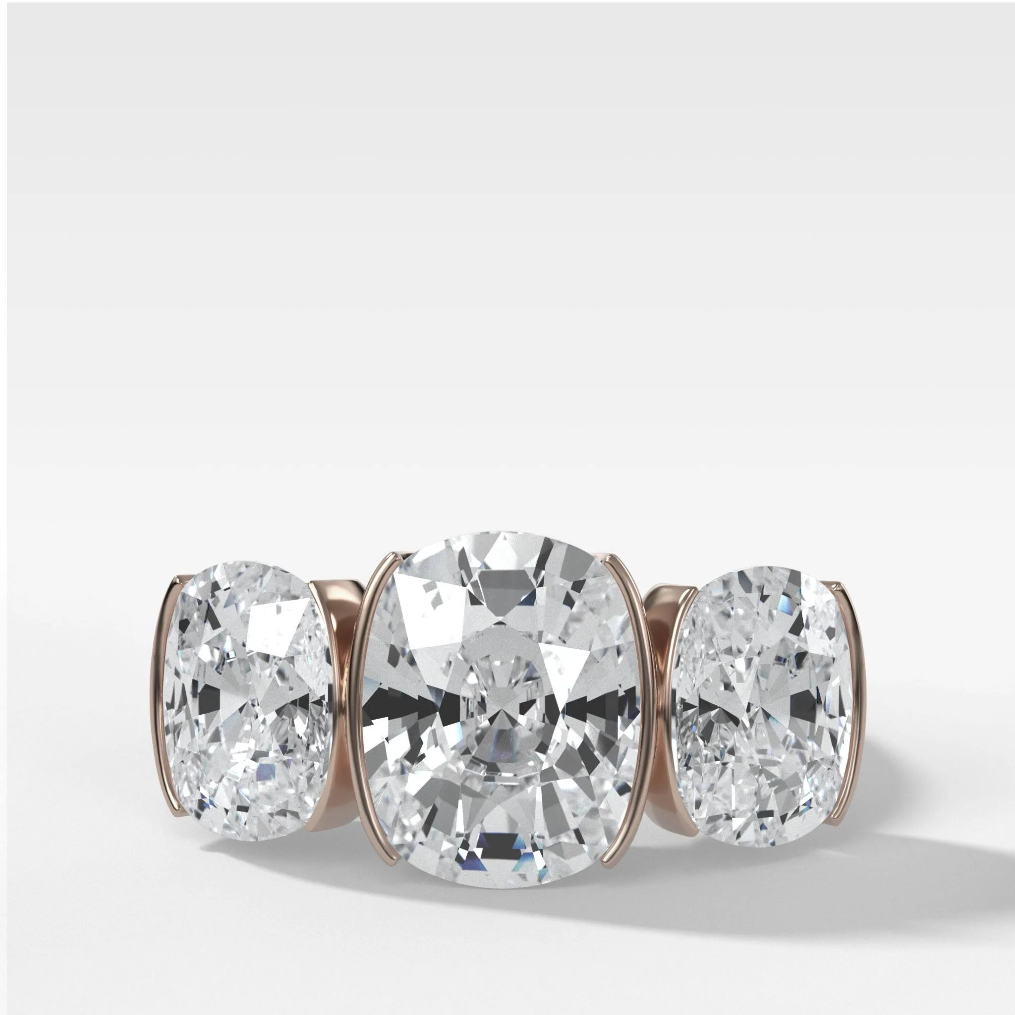 Half Bezel Triad Engagement Ring With Elongated Cushion Cut Diamonds