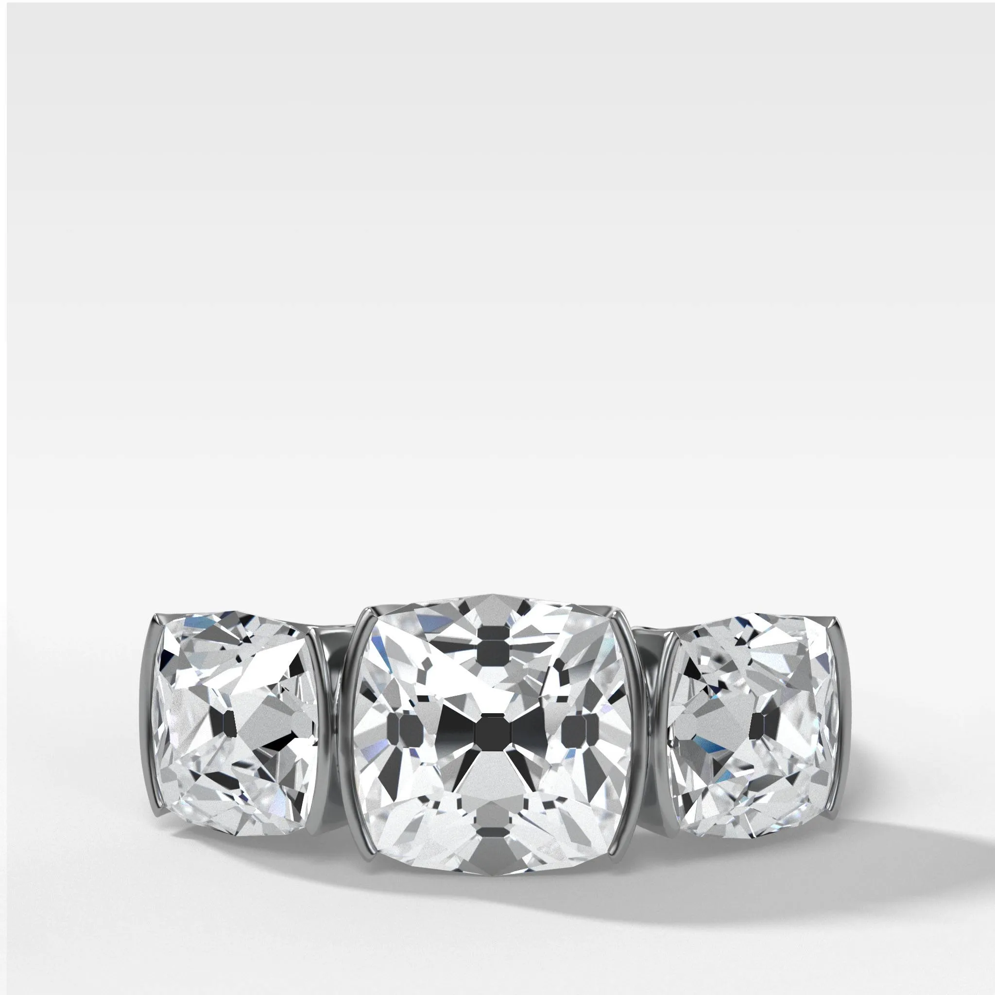 Half Bezel Triad Engagement Ring With Old Mine Cut Diamonds