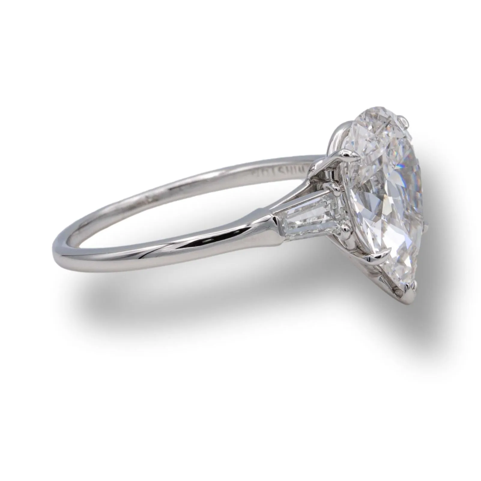 Harry Winston Platinum Pear Shape Diamond Engagement Ring with Baguettes Circa 1960's