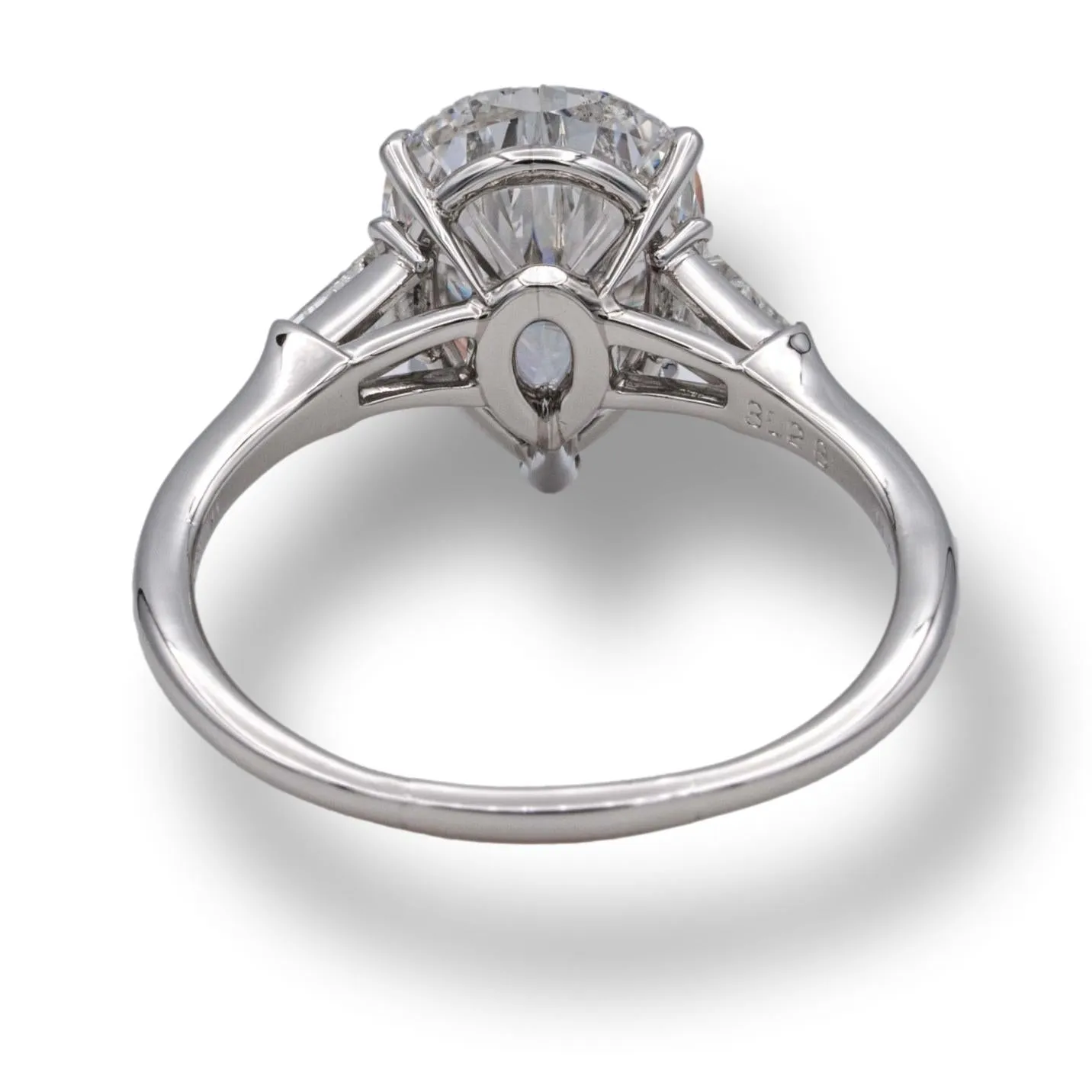 Harry Winston Platinum Pear Shape Diamond Engagement Ring with Baguettes Circa 1960's