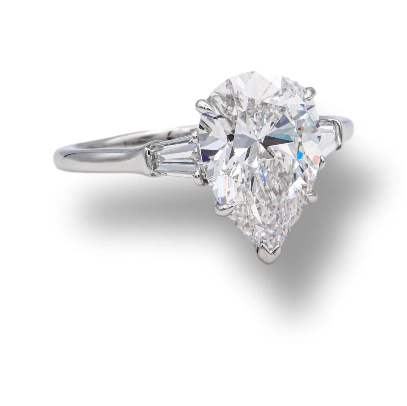 Harry Winston Platinum Pear Shape Diamond Engagement Ring with Baguettes Circa 1960's
