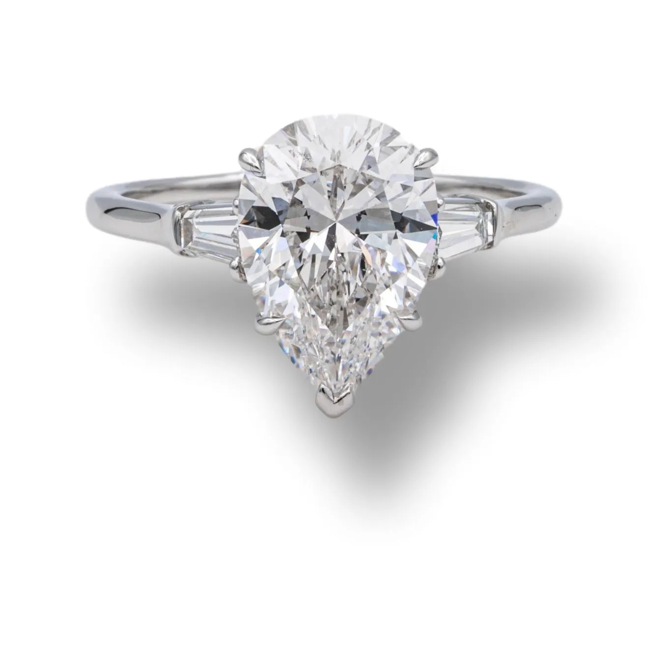 Harry Winston Platinum Pear Shape Diamond Engagement Ring with Baguettes Circa 1960's