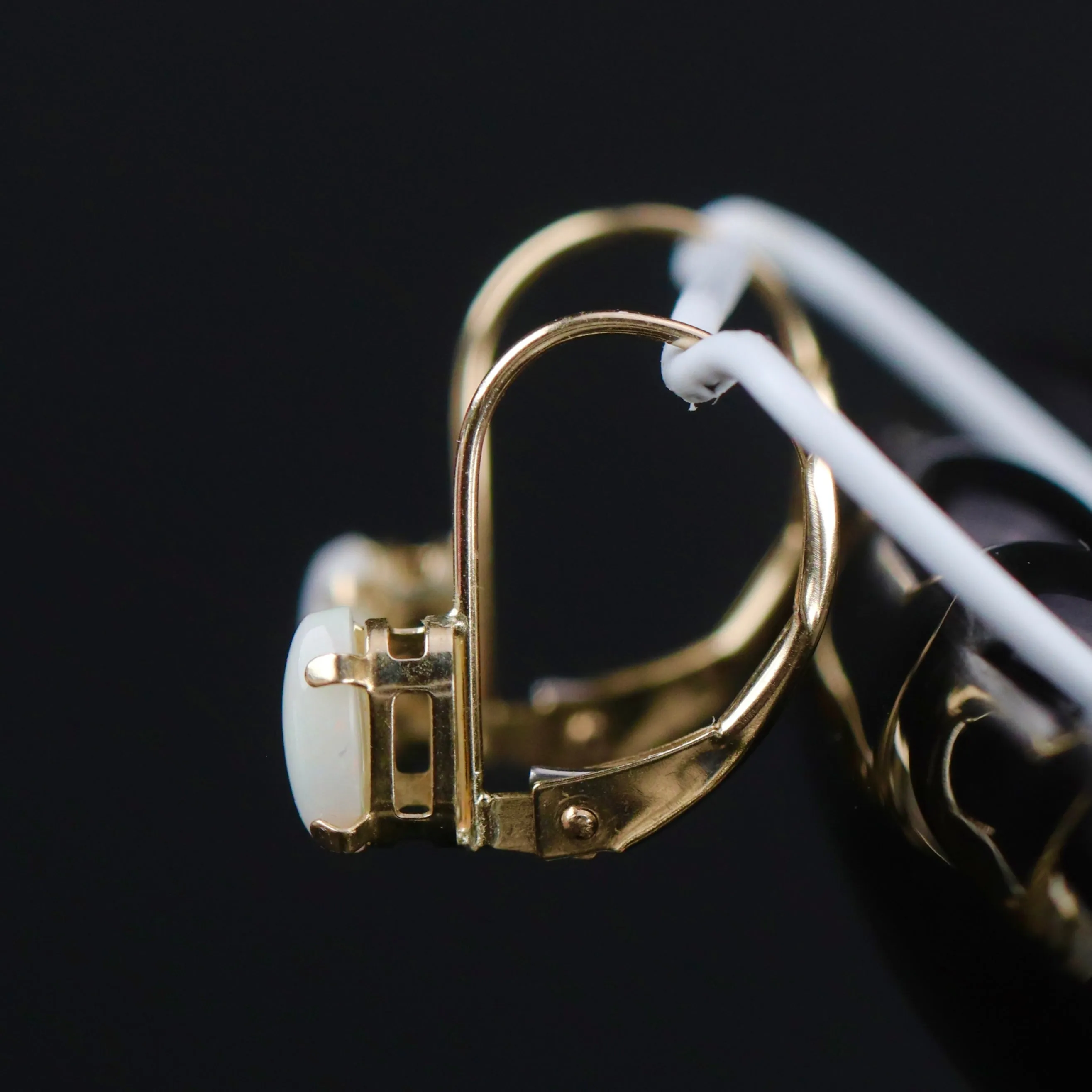 Opal leverback earrings in yellow gold