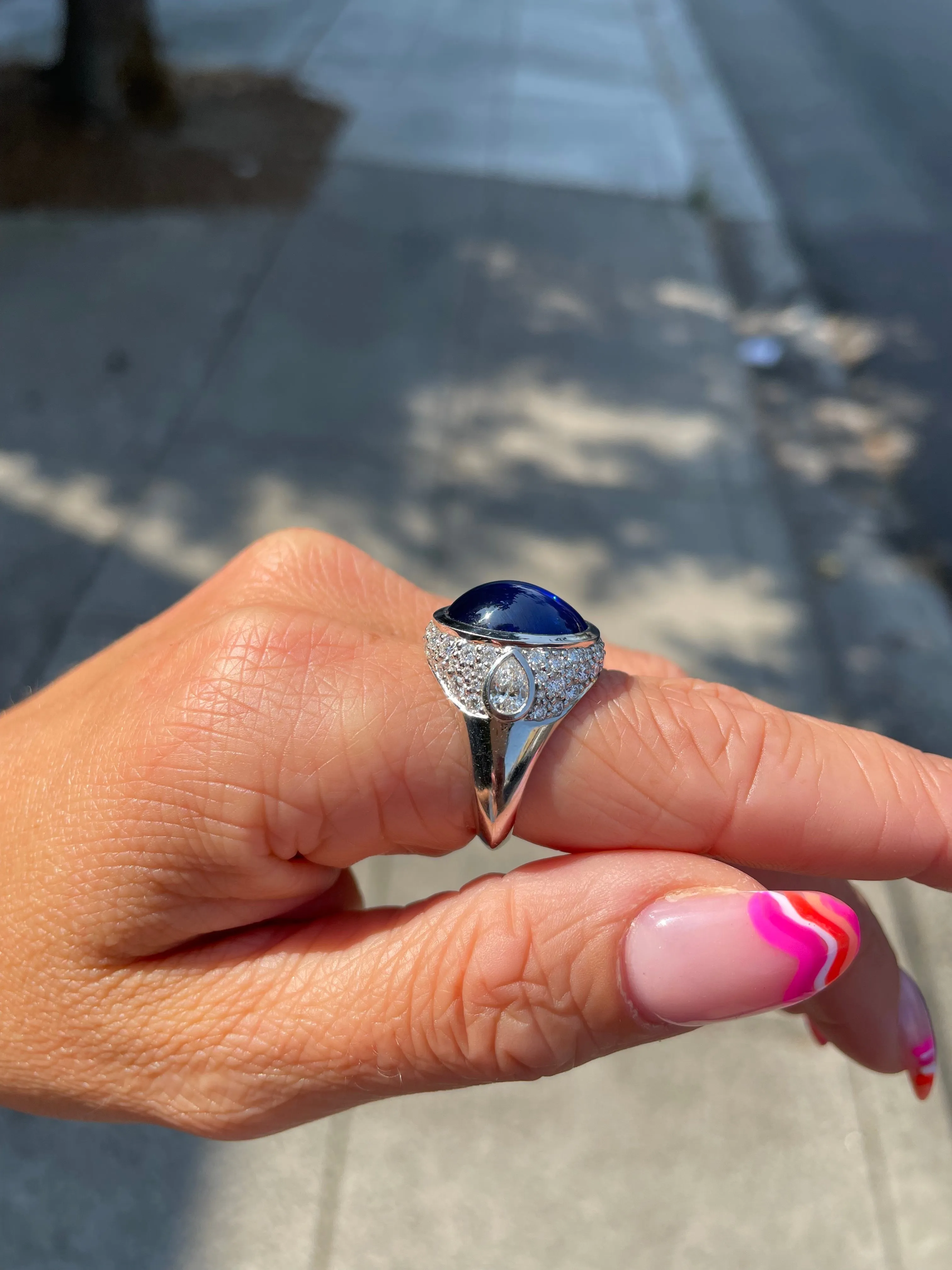 Platinum Bezel Set Oval Cabochon Sapphire And Diamond Ring (13.40ctw)