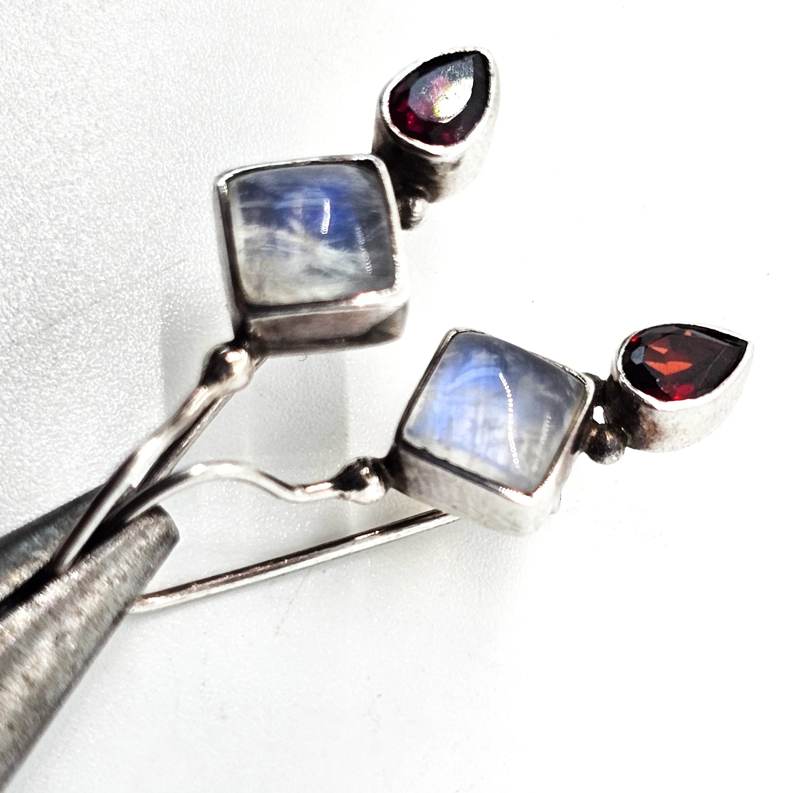 Princess cut blue flash moonstone and garnet tribal sterling silver earrings