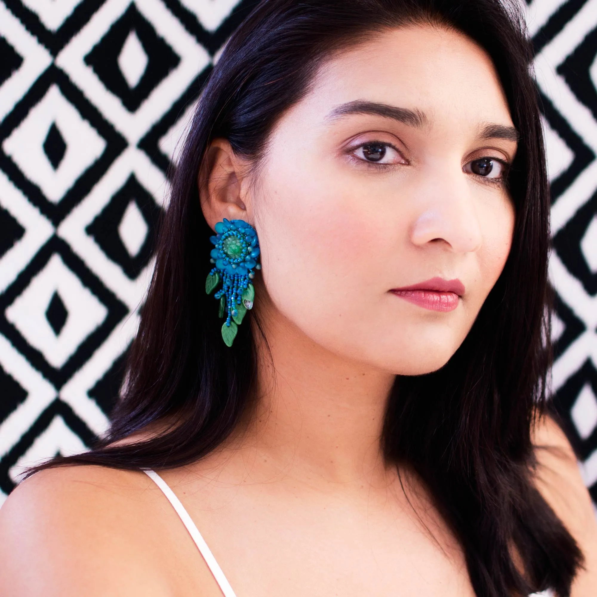 Teal green beaded statement earrings with vintage cabochon