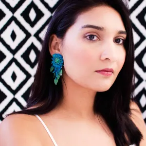 Teal green beaded statement earrings with vintage cabochon