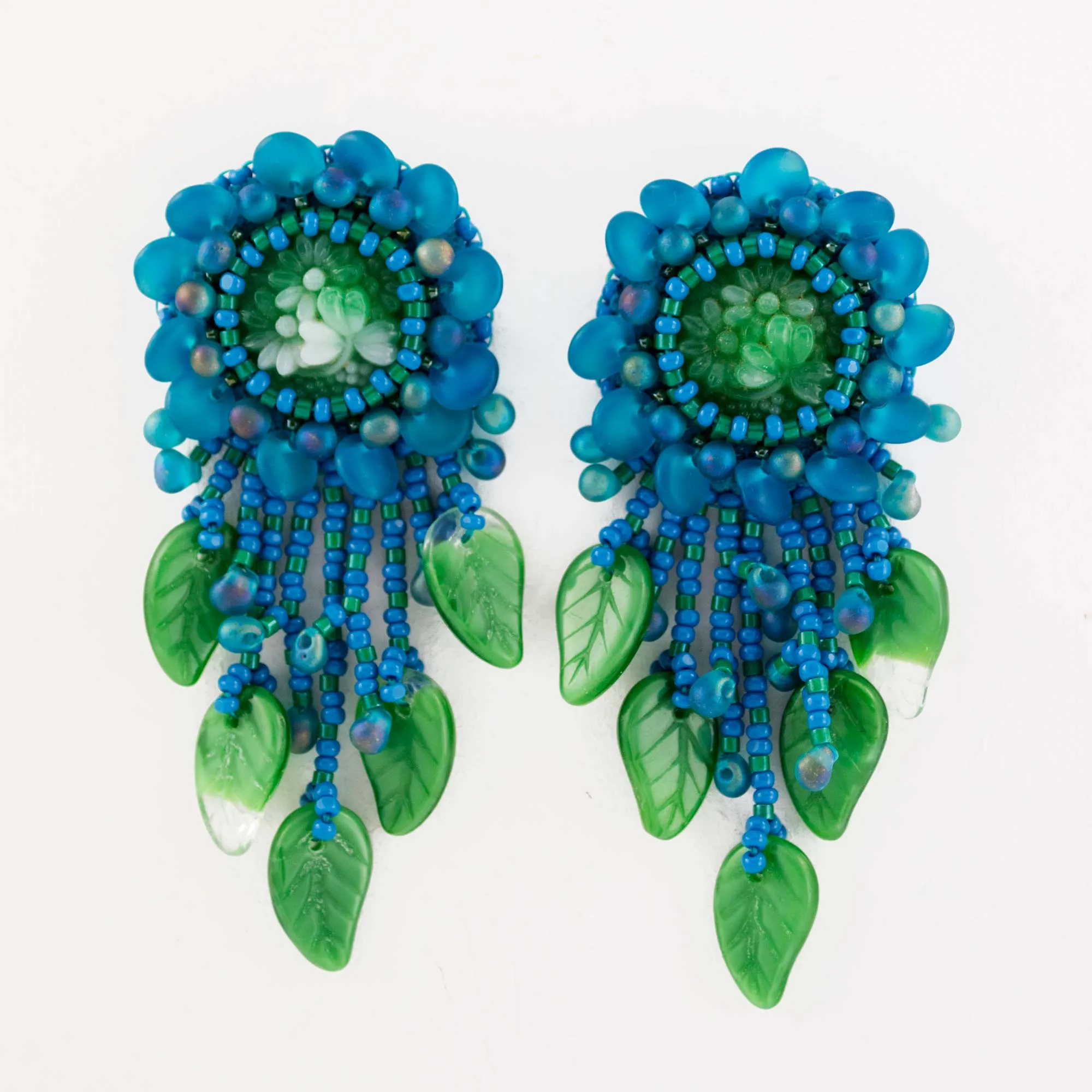 Teal green beaded statement earrings with vintage cabochon
