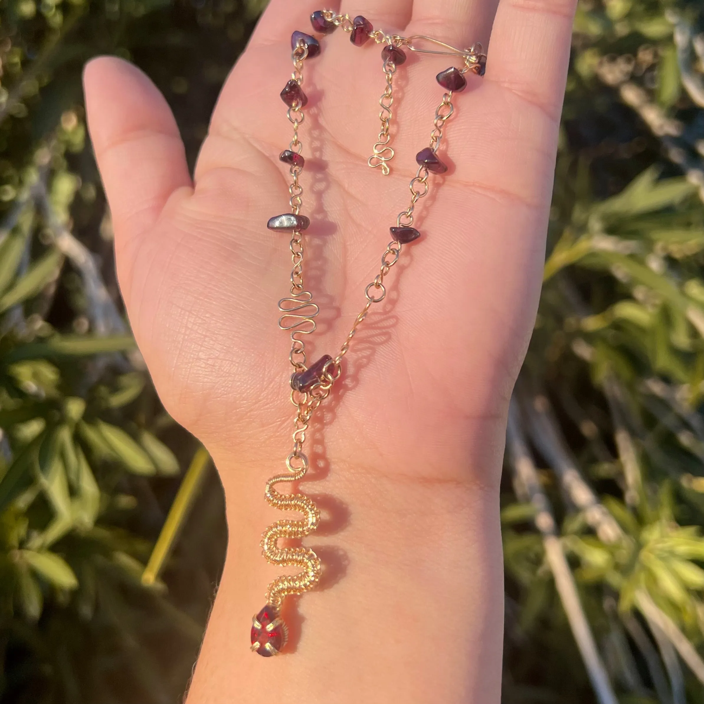 The Garnet Medusa Serpent 𓆙
