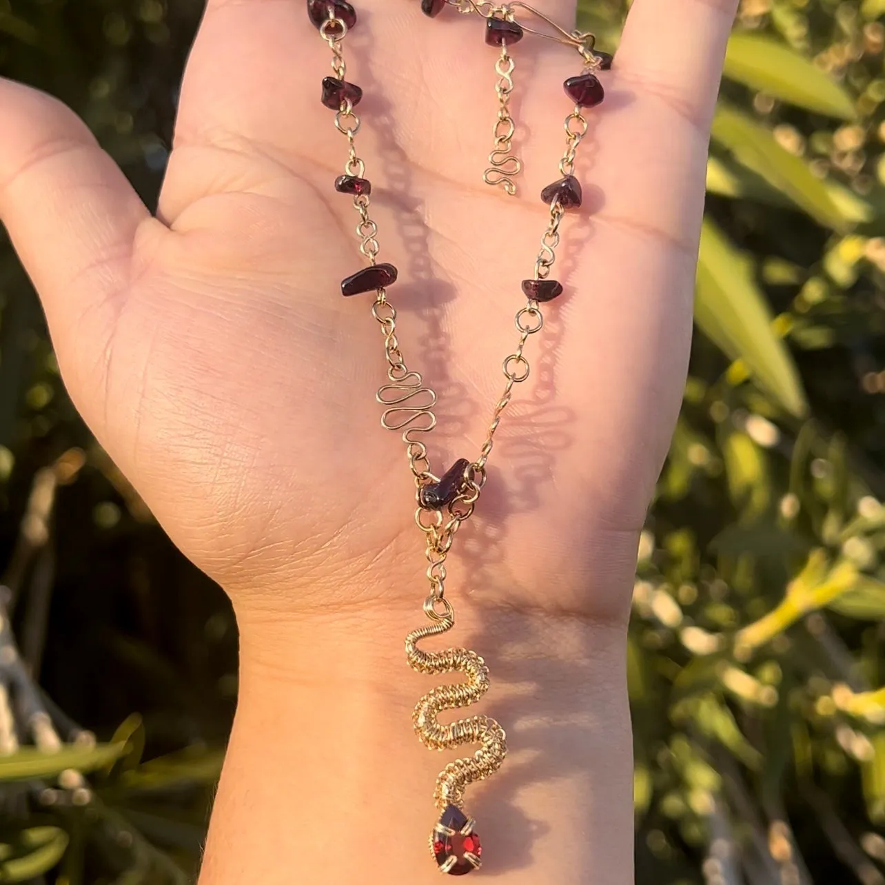 The Garnet Medusa Serpent 𓆙