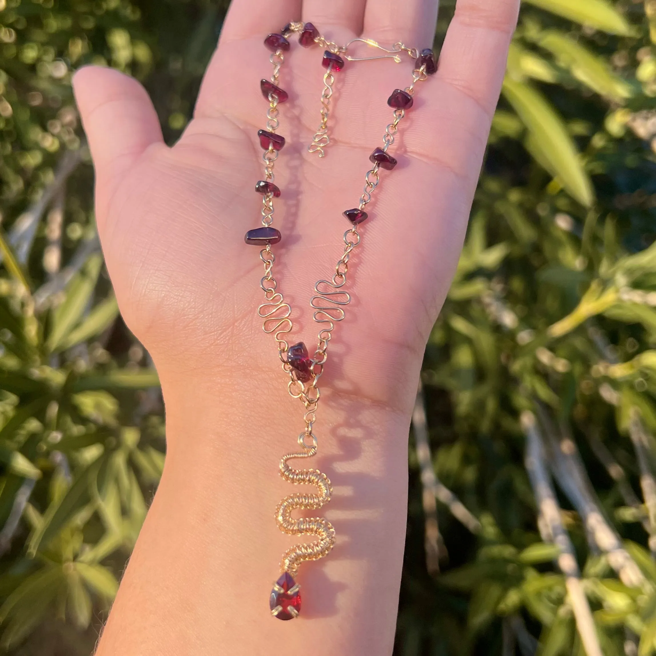 The Garnet Medusa Serpent 𓆙