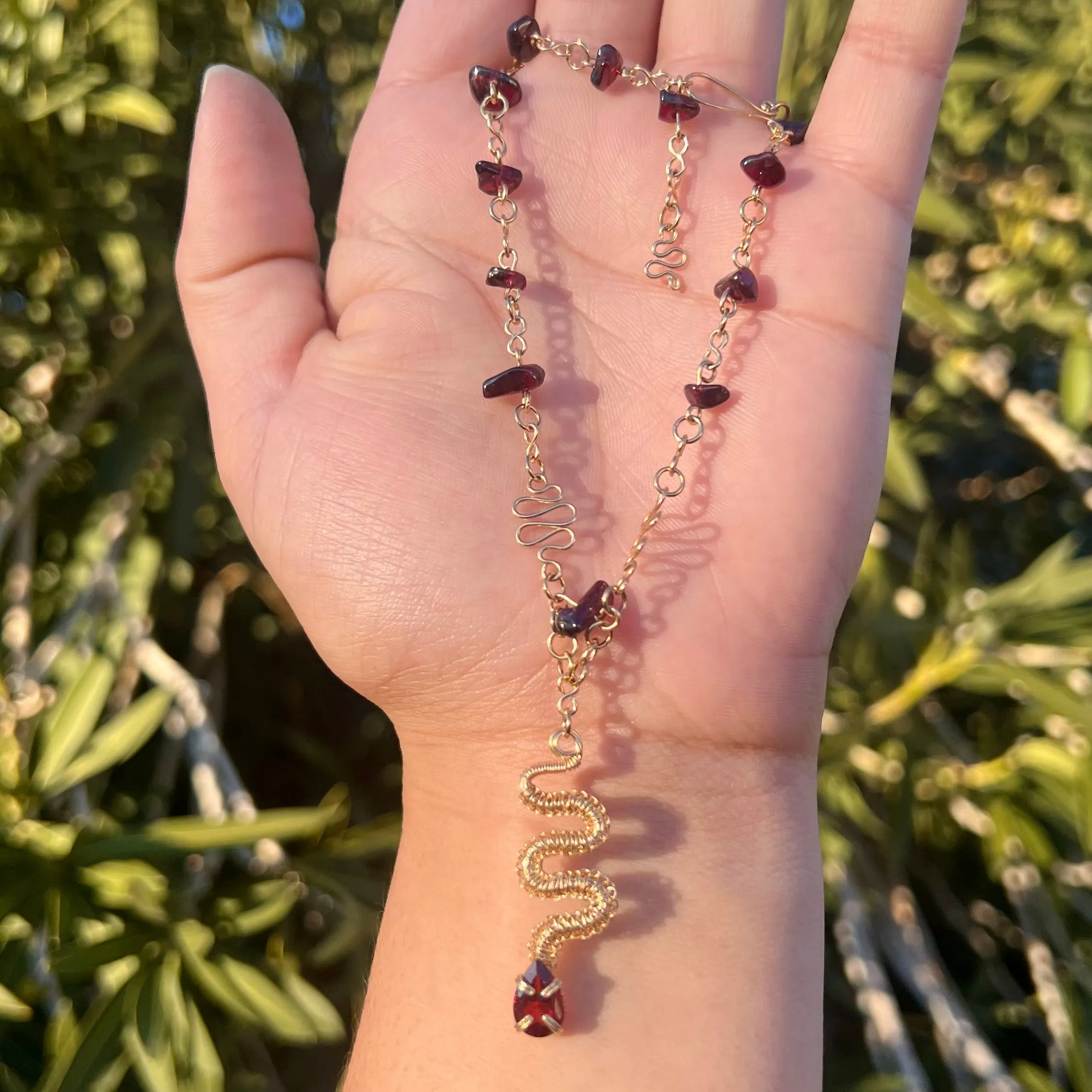 The Garnet Medusa Serpent 𓆙