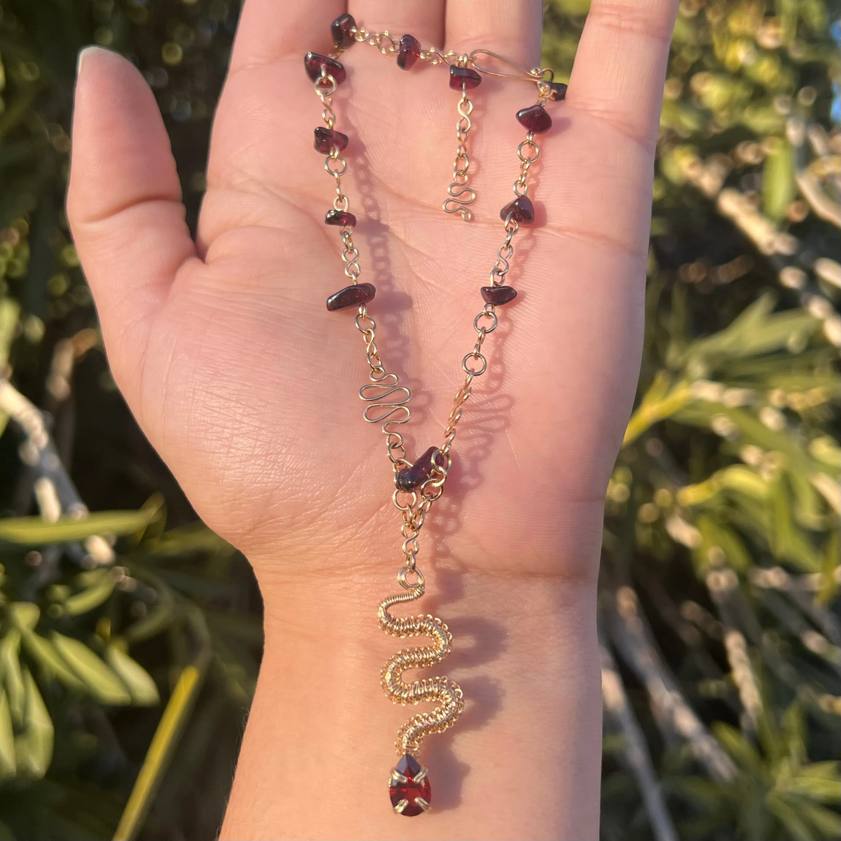 The Garnet Medusa Serpent 𓆙