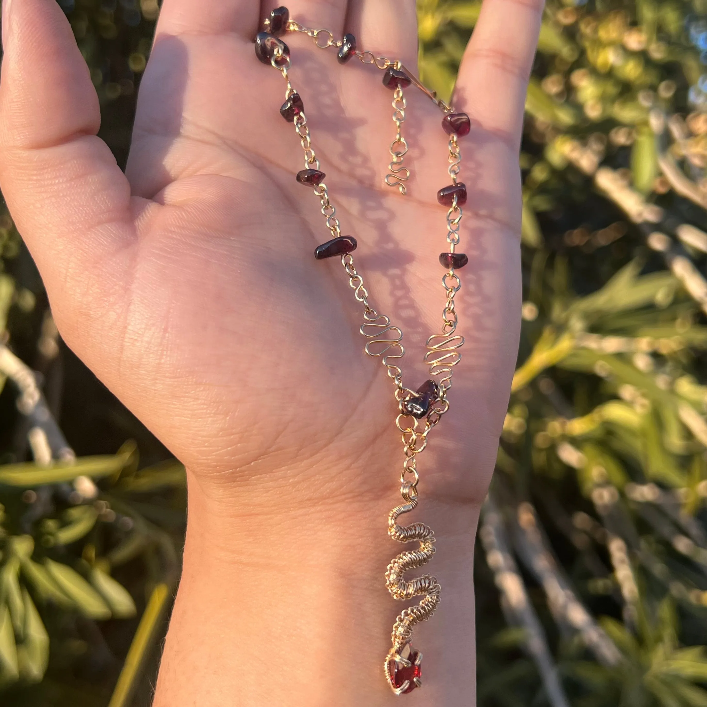 The Garnet Medusa Serpent 𓆙