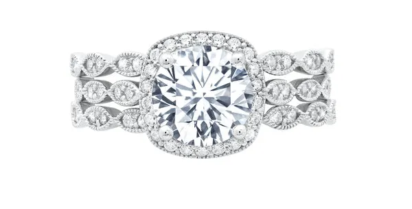 THREE RING STACK WITH BRILLIANT CENTER STONE FINISHED IN PURE PLATINUM