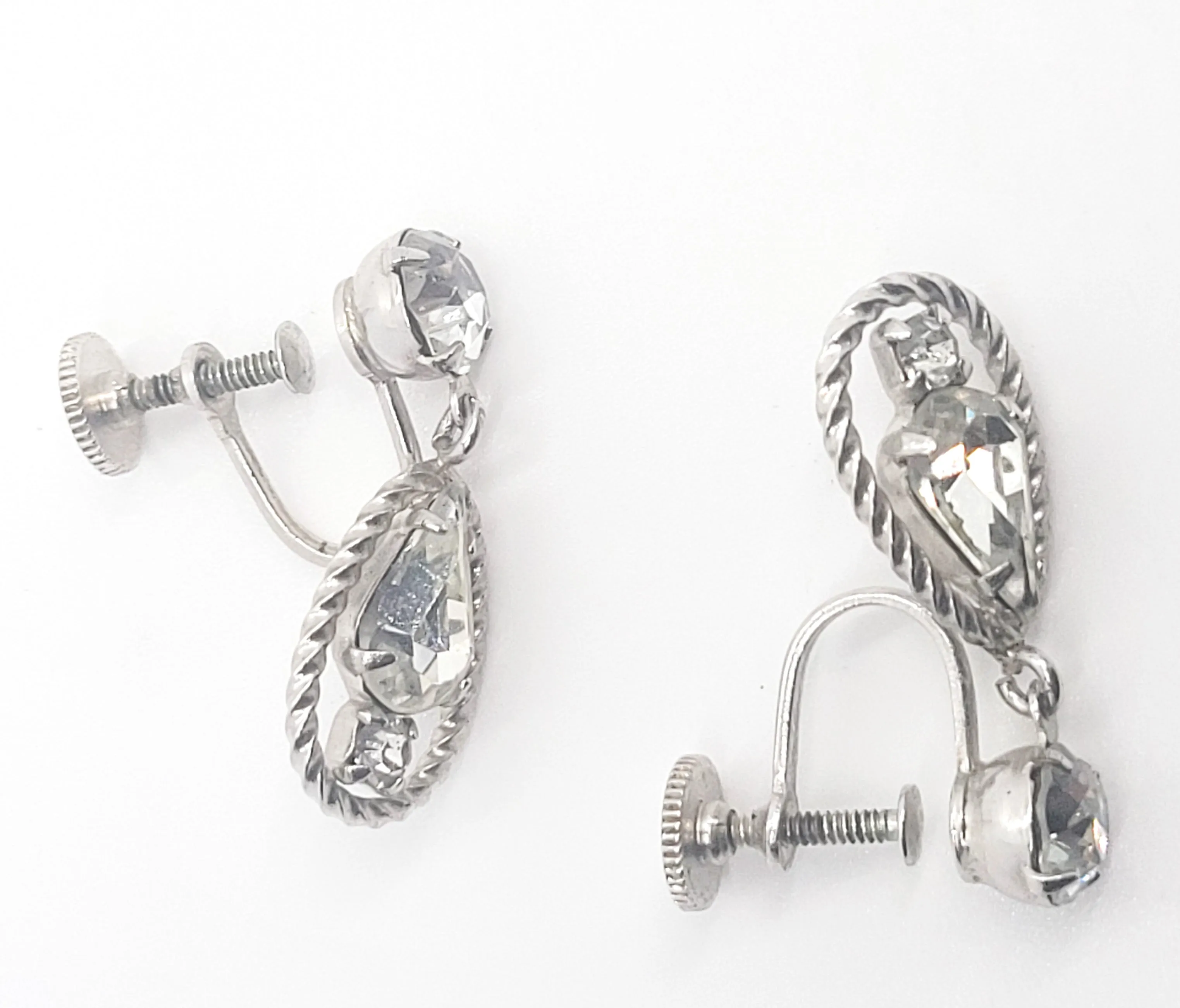 Twisted rope clear rhinestone silver toned screw back earrings
