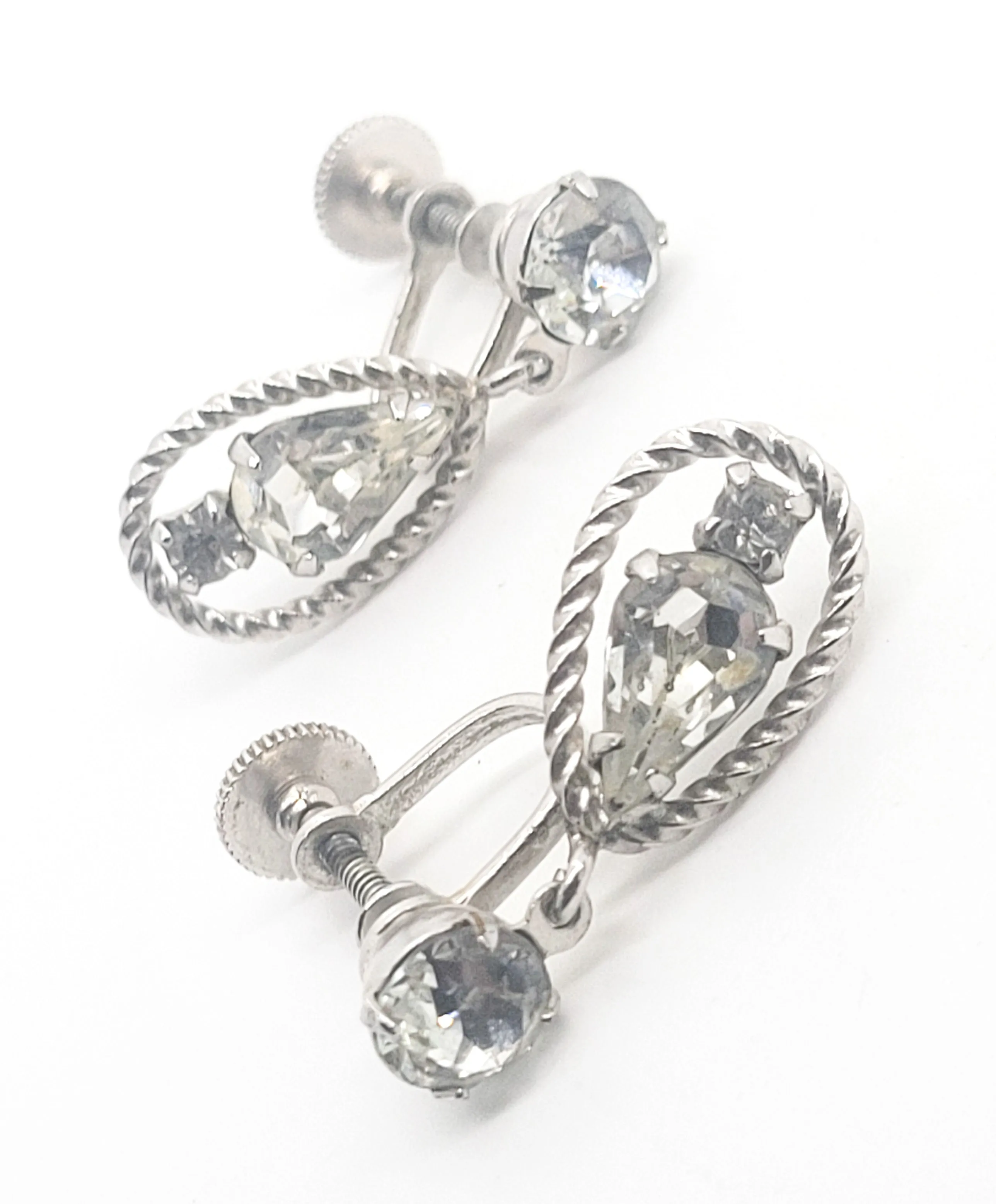 Twisted rope clear rhinestone silver toned screw back earrings