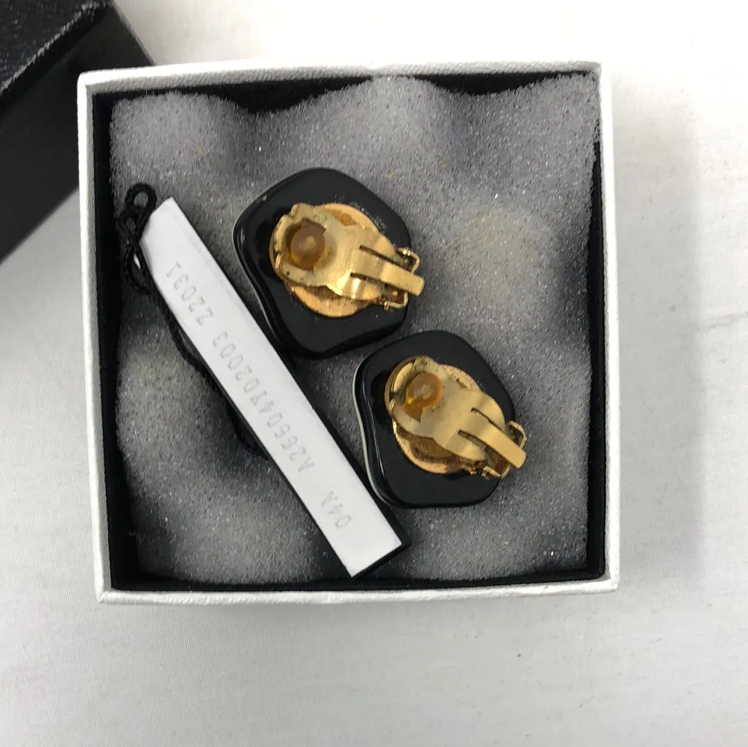Vintage: CHANEL Camellia Black and White clip on Earrings